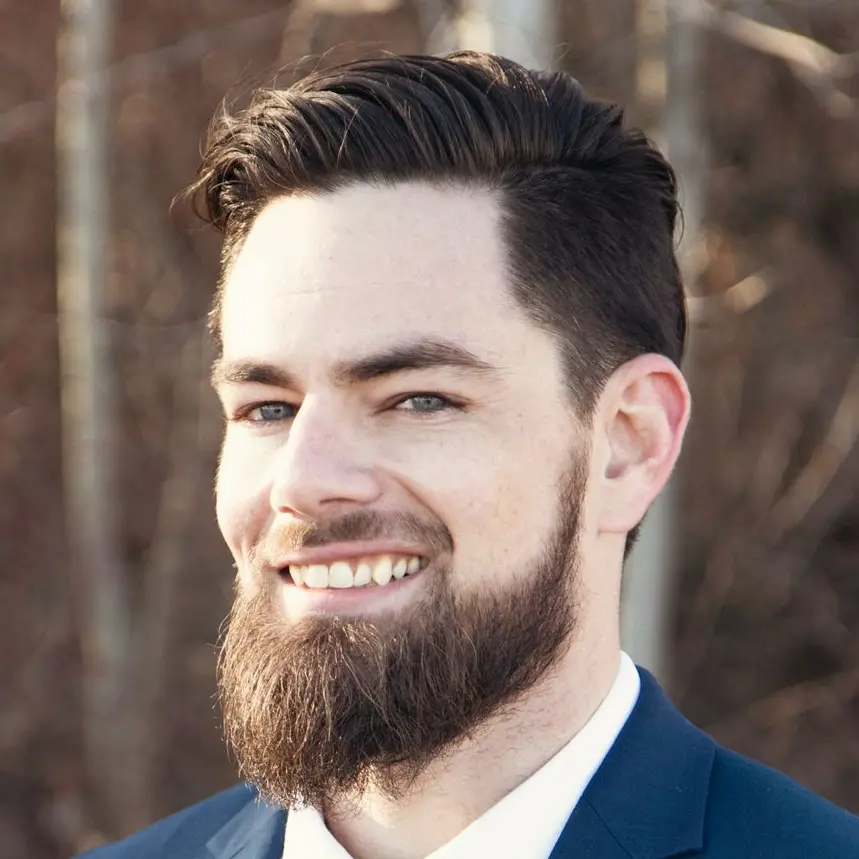 smiling man wearing suit